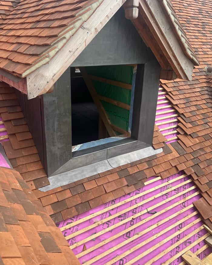 Tiled dormer with roof membrane and battens
