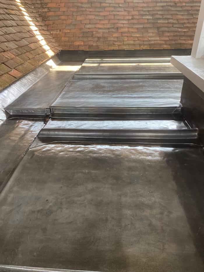 Lead-lined roof junction and stepped detail